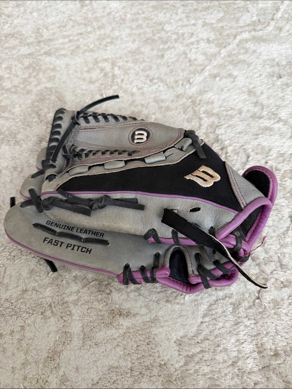 Wilson Fast Pitch Softball Glove in Gray, for left handed thrower